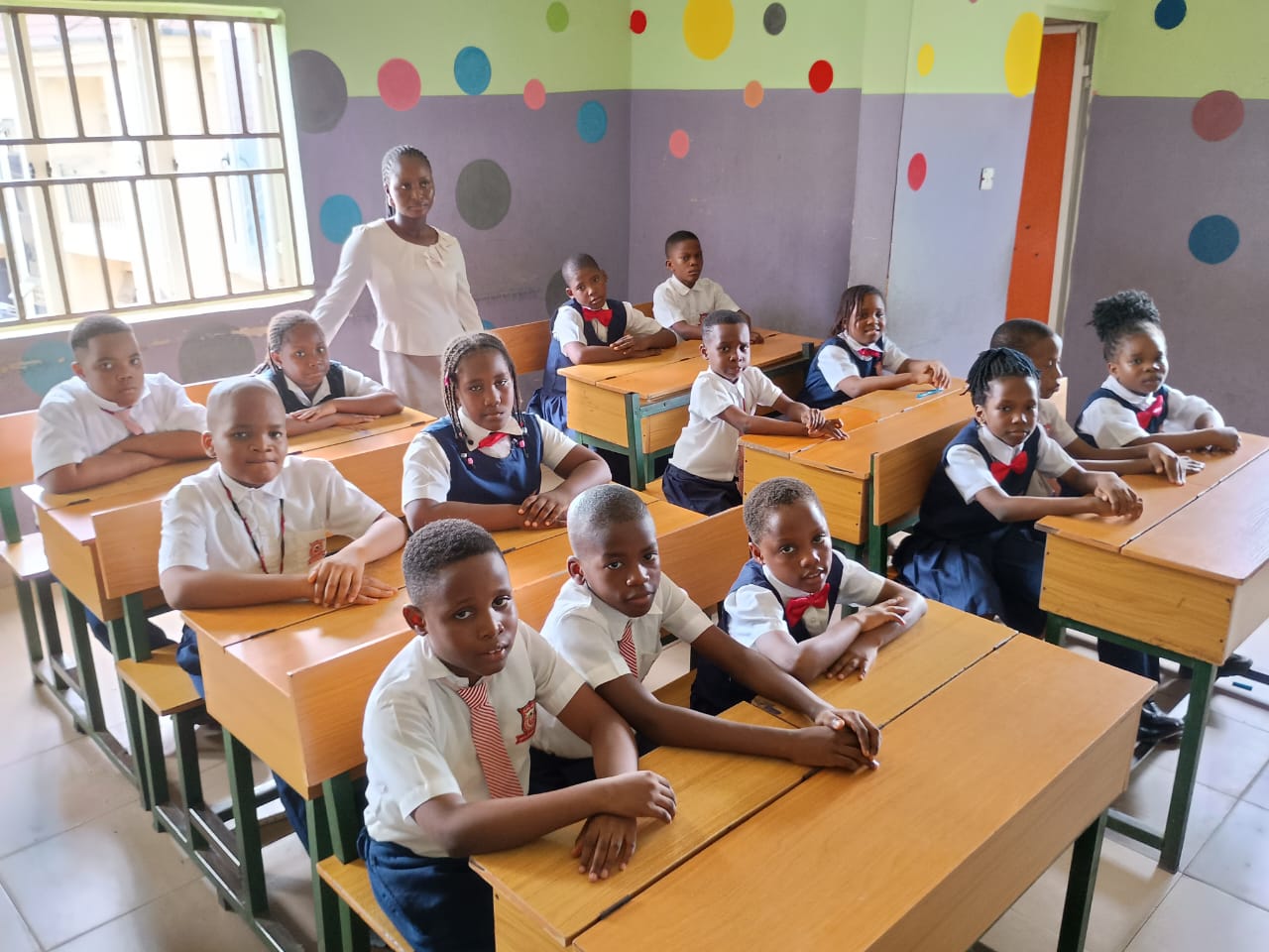 Grade School pupils seated at their desks in class